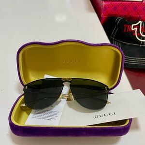 Gucci Black and Gold Sunglasses